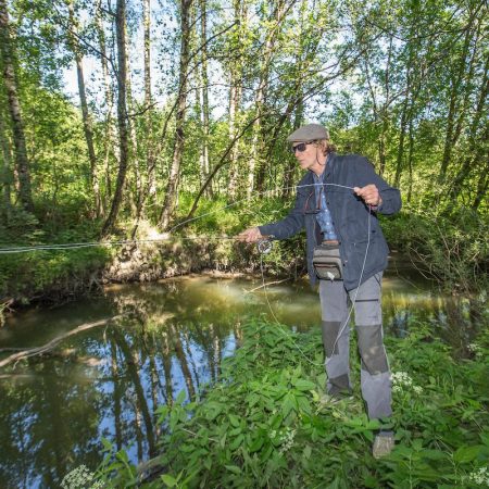 man fishing in the Alna river