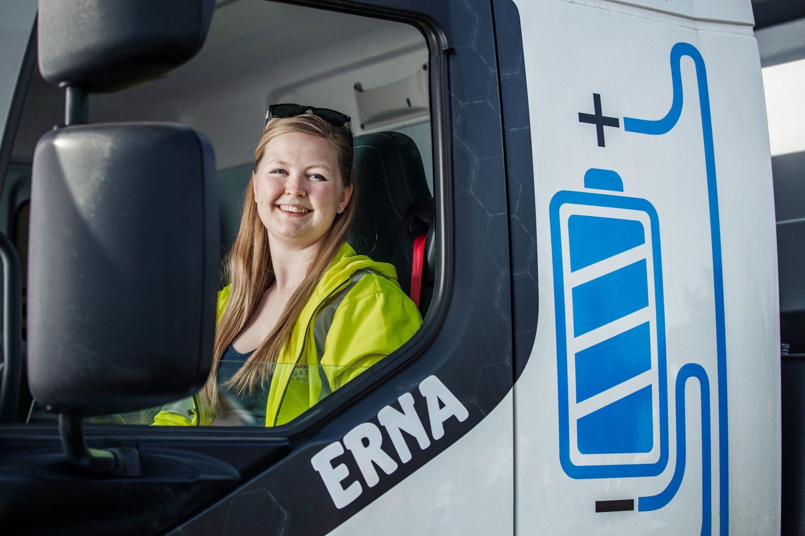 woman in electric truck