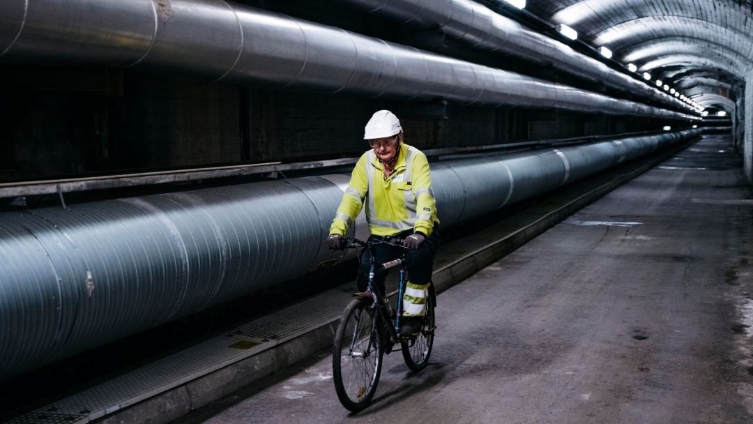 inspection, district heating plant, man on bicycle