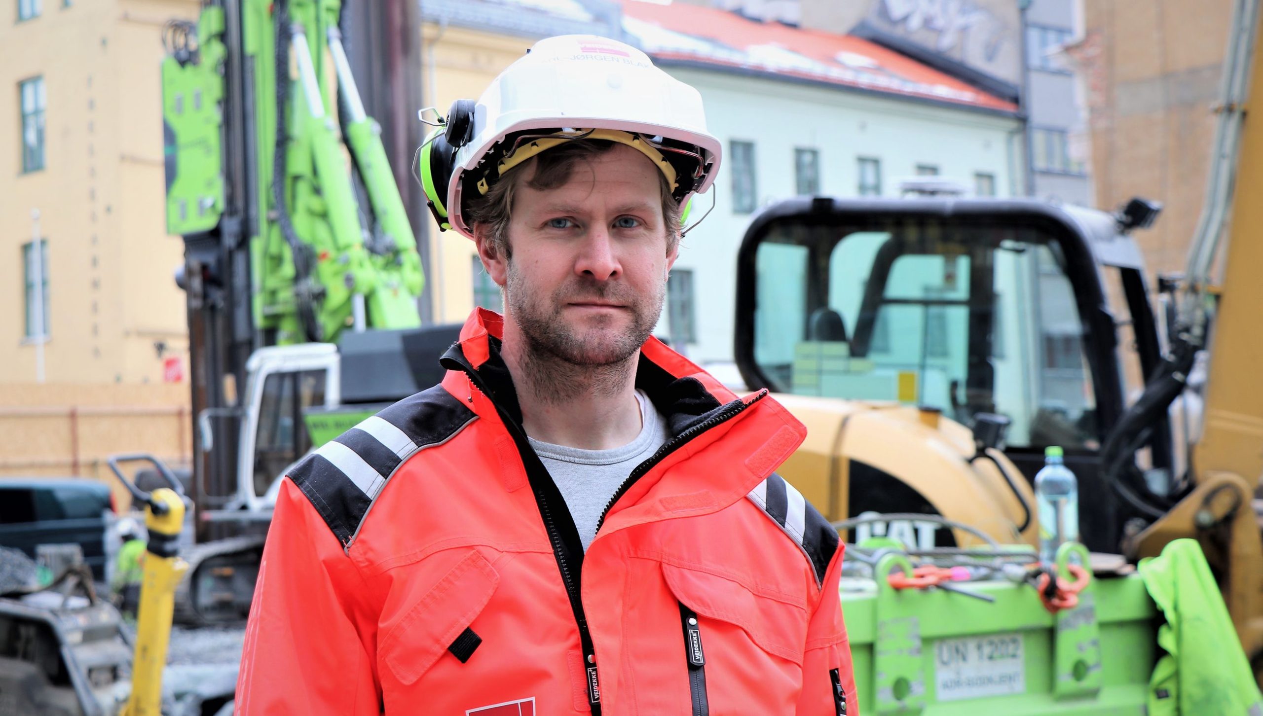 man with helmet on construction site