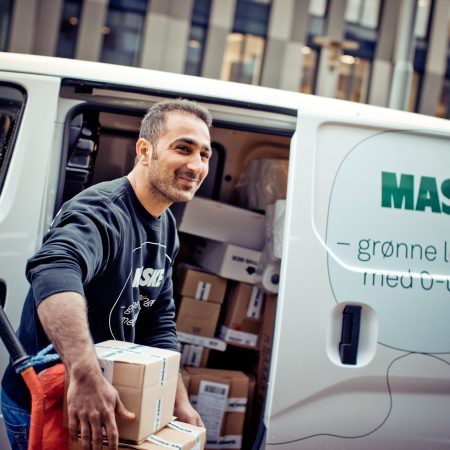 man loading electric van