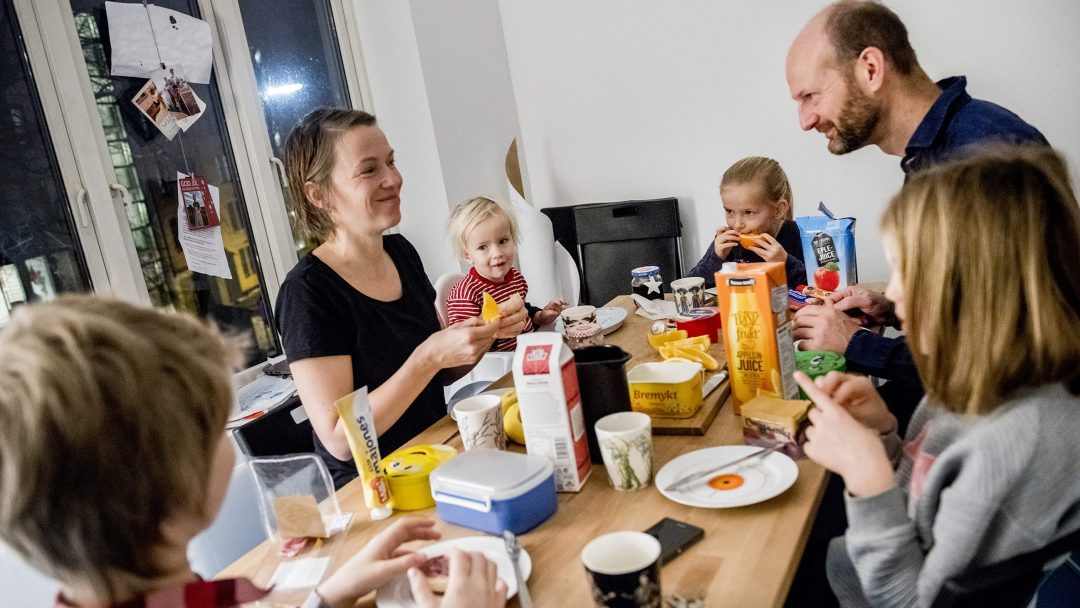 family around breakfast table