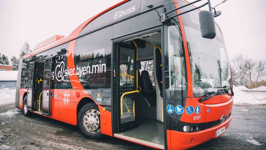 red, electric bus