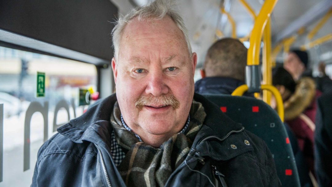 passenger riding on an electric bendy bus